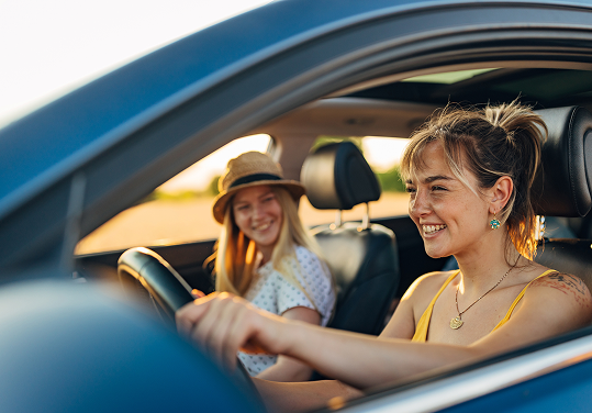 Women driving in car